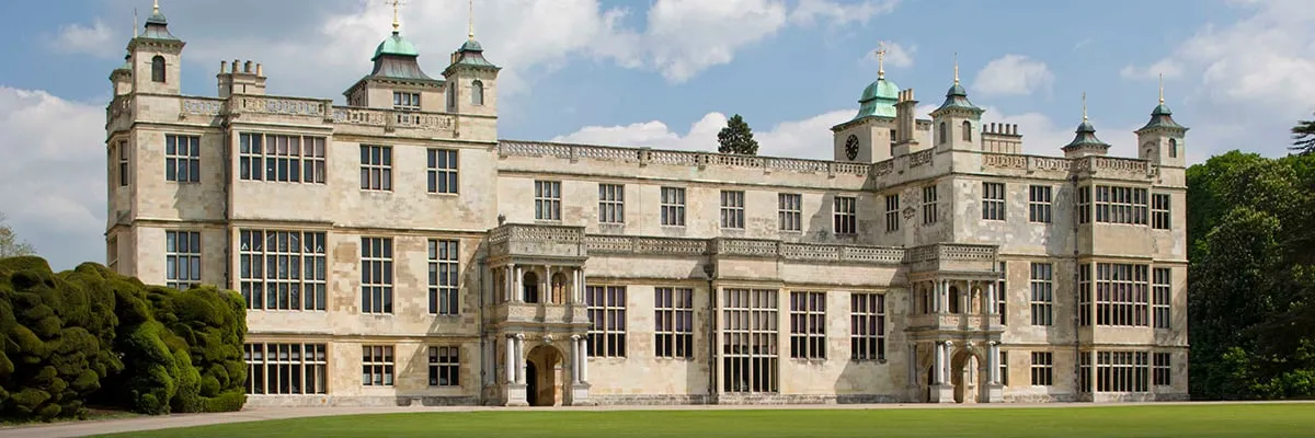 The west front's two-storey porches facing the lawn