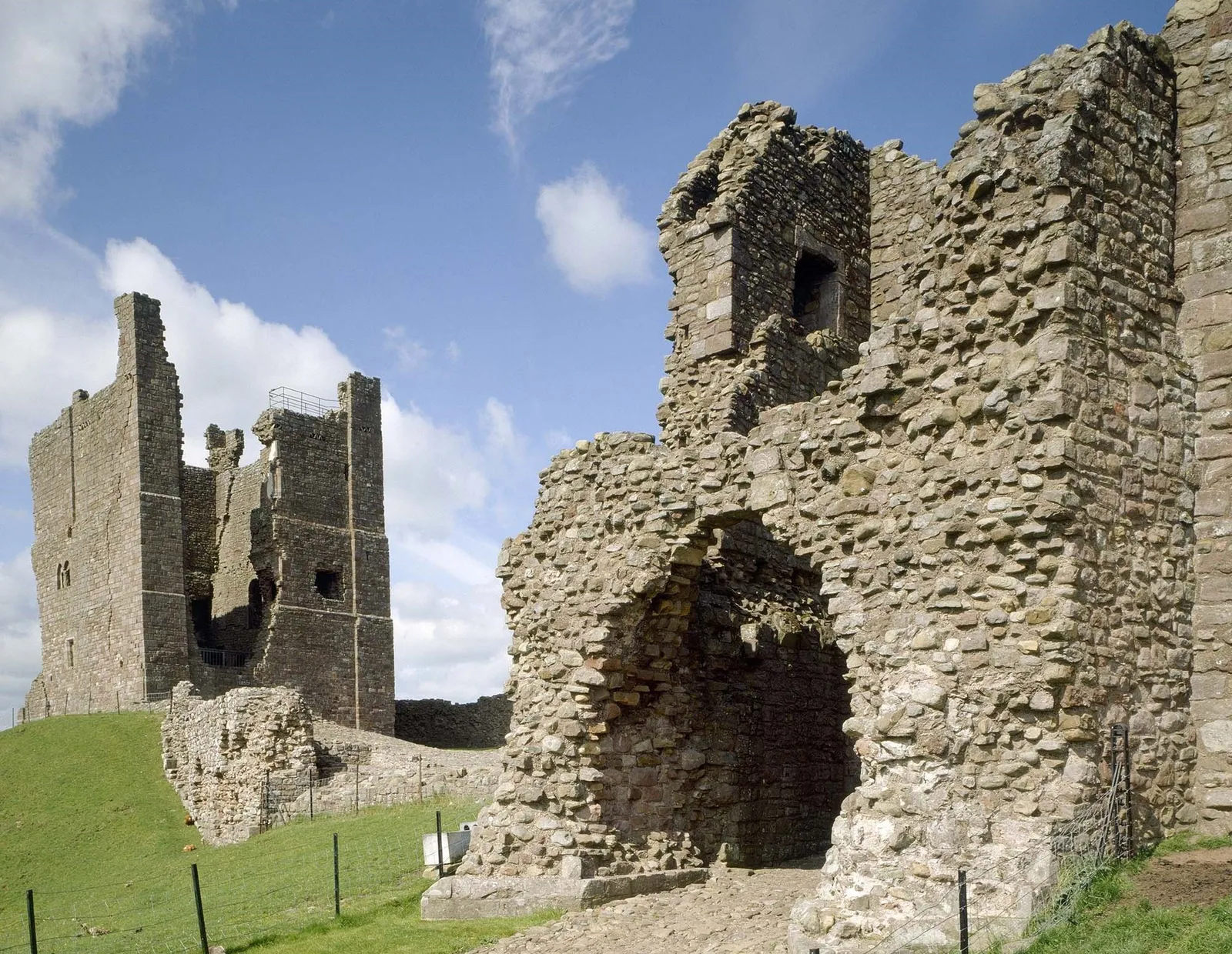 Brough Castle's keep seen past the rubble walls of the gatehouse