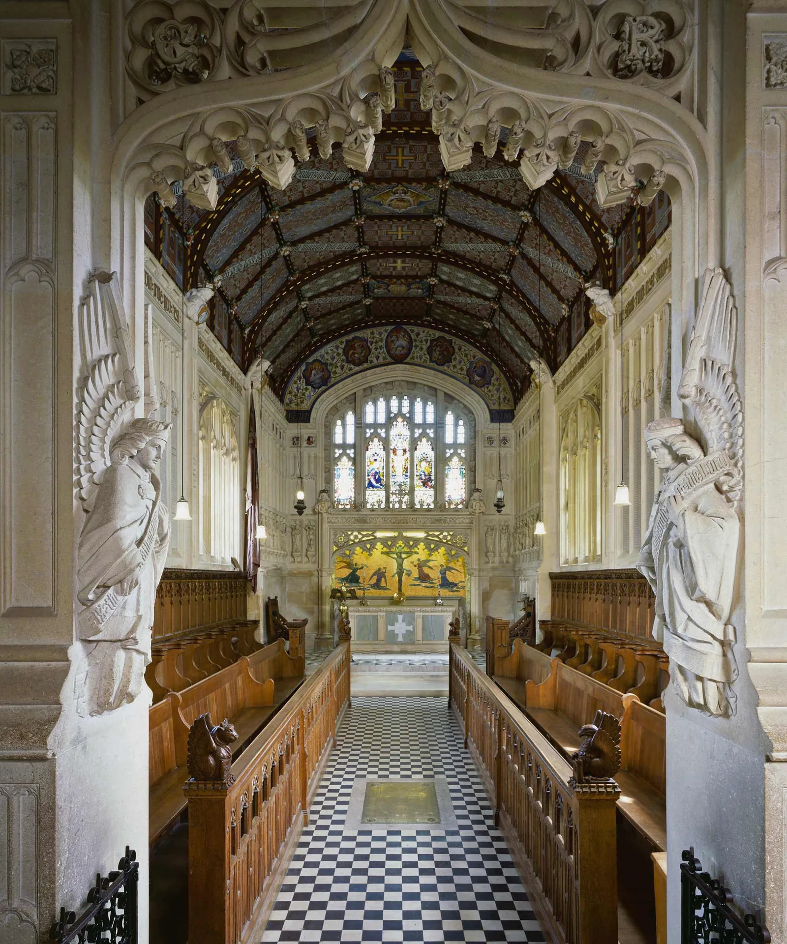 Carved stone angels and oak stalls in the castle chapel
