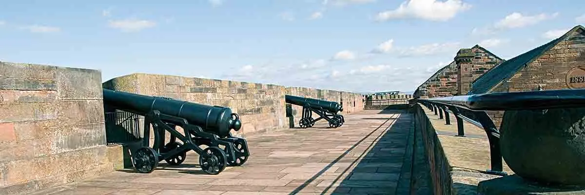 Cannon on the broad wall walk of the castle battery
