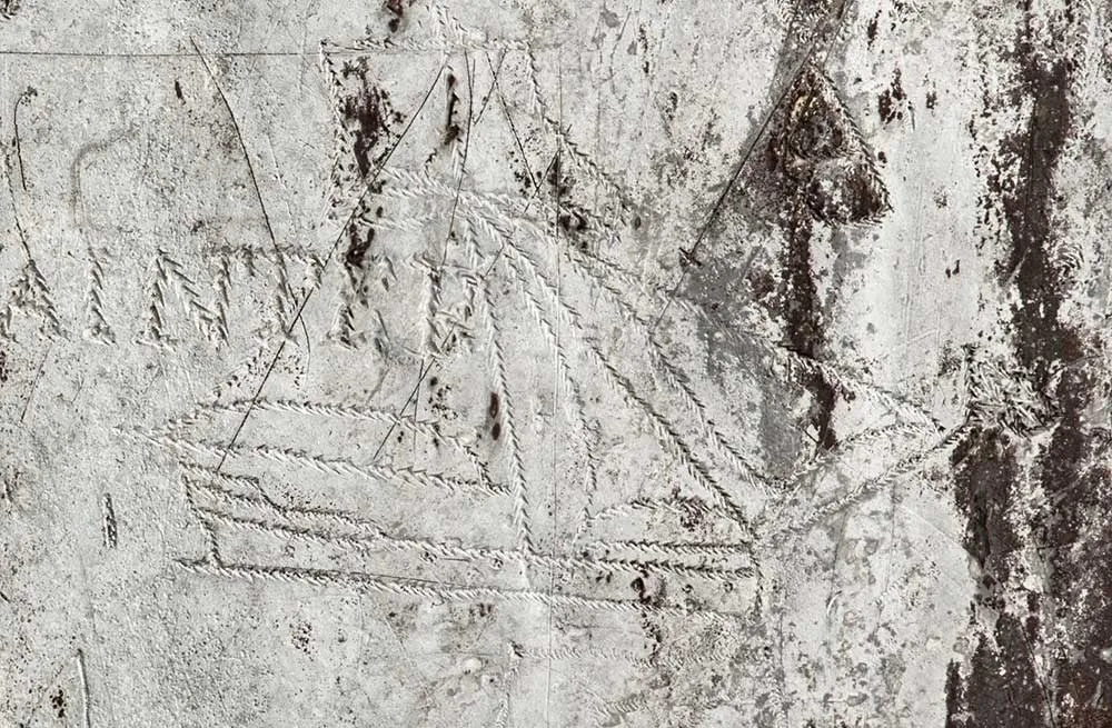 A sailing ship scratched into the lead roof by an 18th-century hand