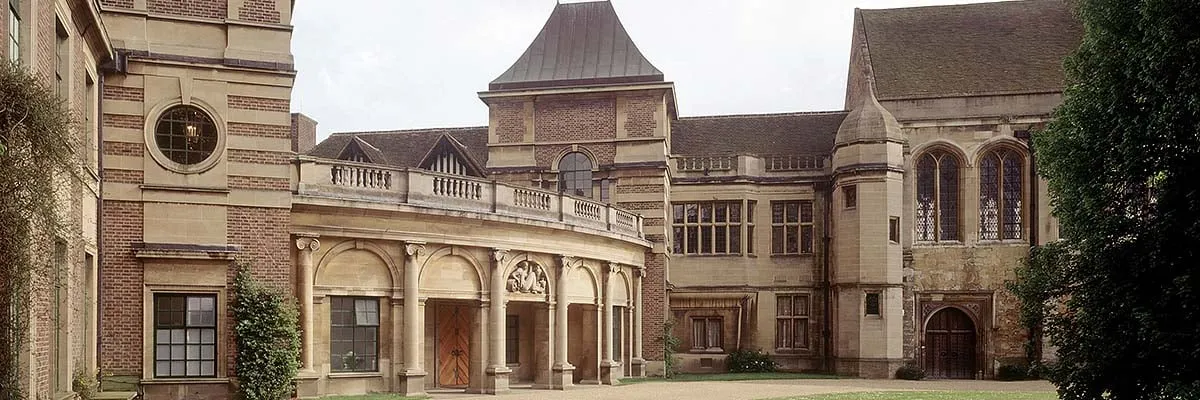 The curved colonnade of the entrance court beside the medieval great hall