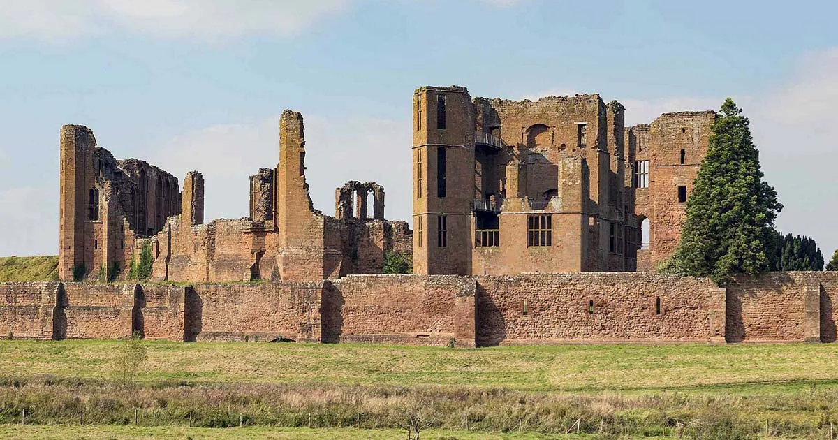 The castle ruins behind the long outer curtain wall