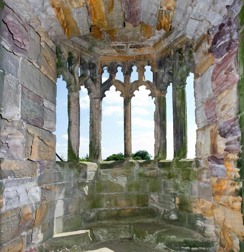 Looking out through the slender traceried openings of Marmion Tower's oriel window from inside