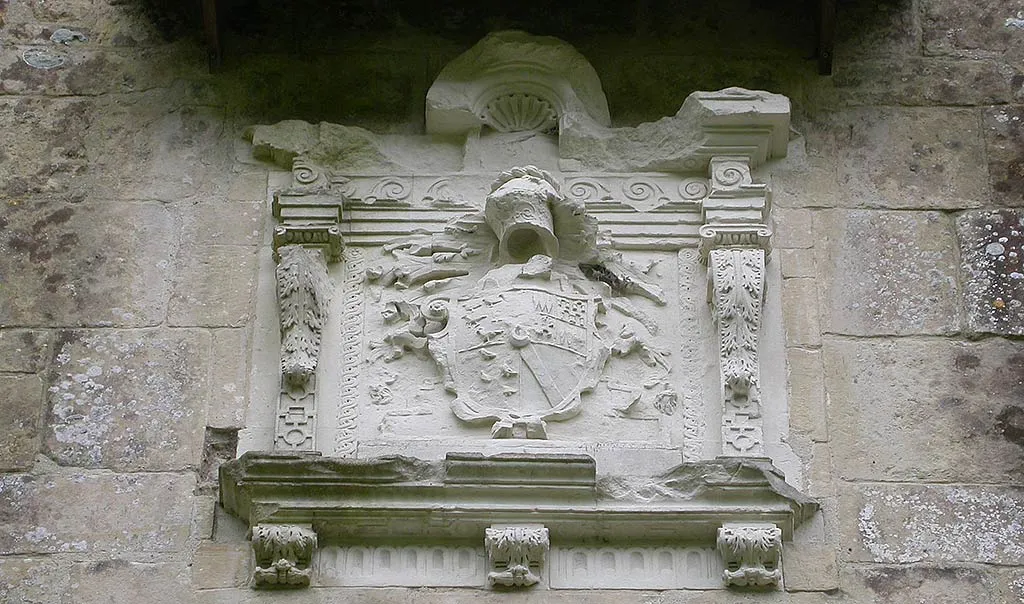 The carved Arundell coat of arms set into the castle wall