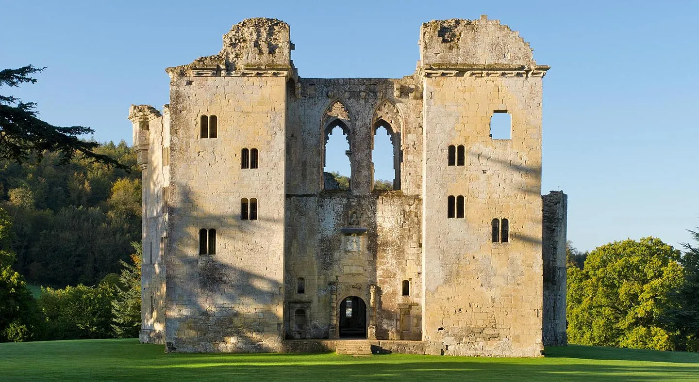 The Elizabethan facade of Old Wardour Castle's hexagonal tower house in low evening sun