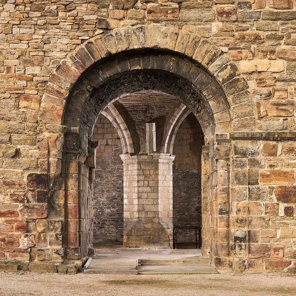 The Norman arch into the keep's vaulted basement