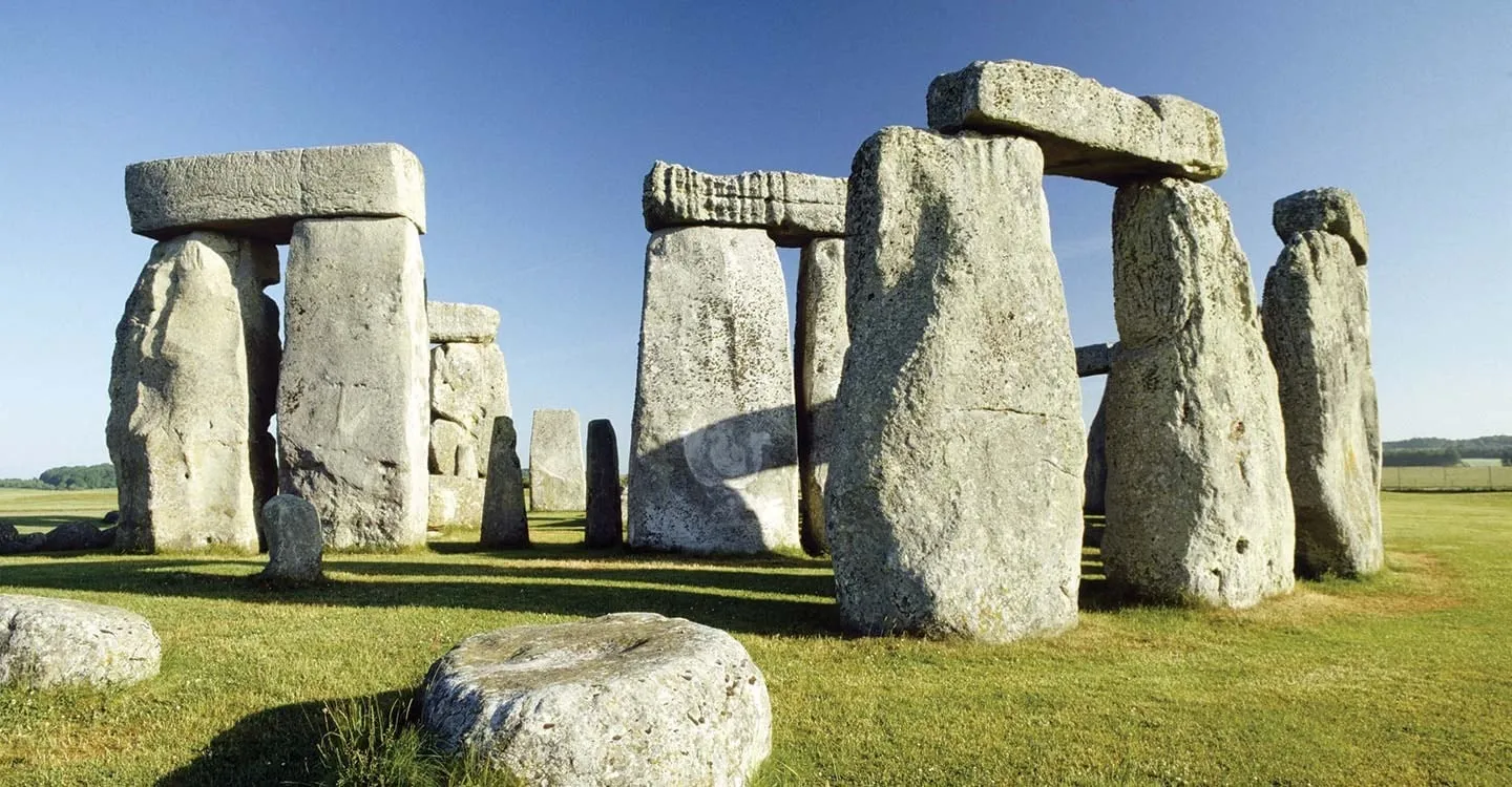 Sarsen trilithons and smaller bluestones inside the circle