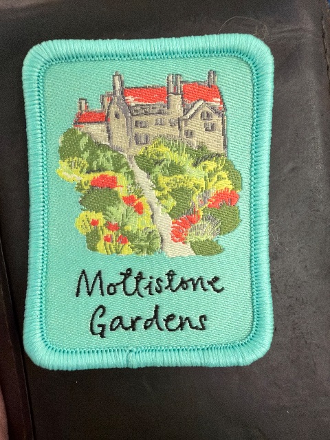 Embroidered badge at Mottistone Gardens