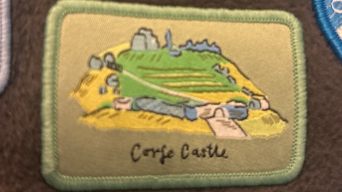 Embroidered badge at Corfe Castle