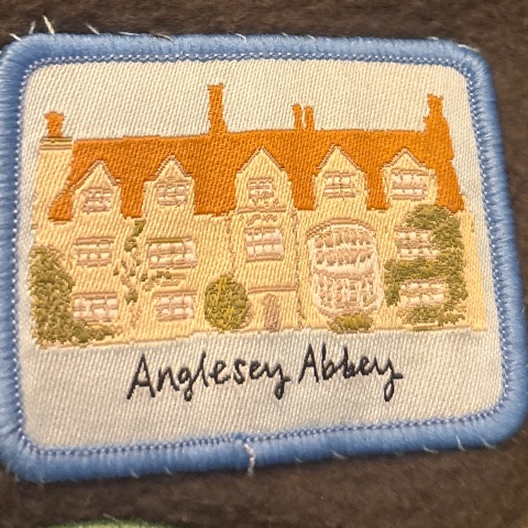 Embroidered badge at Anglesey Abbey