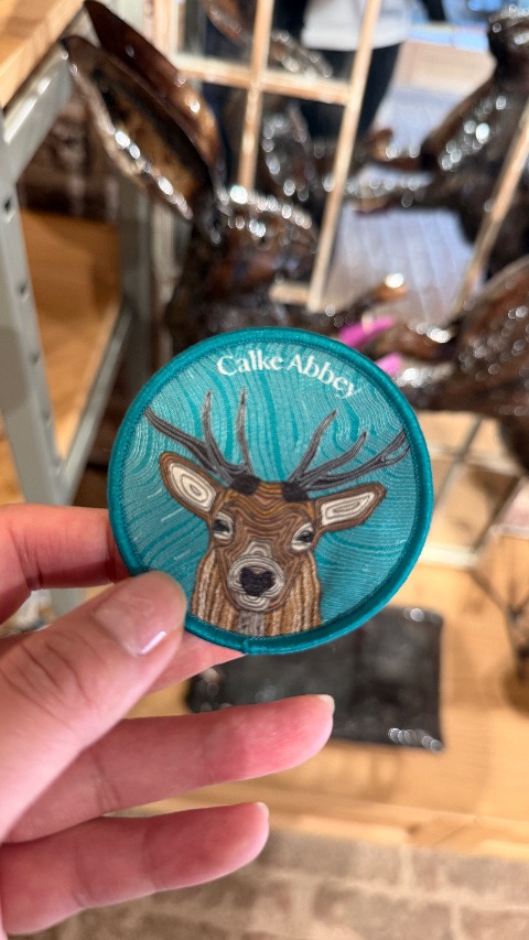 Embroidered badge at Calke Abbey